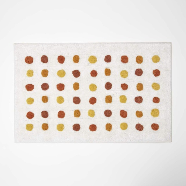 Homescapes Mustard and White Cotton Bath Mat Tufted Polka Dot Design - 50 x 80 cm Orange