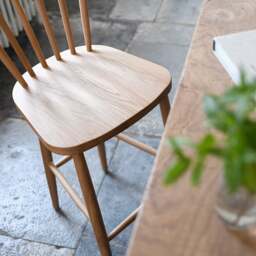 Elkstone Mellow Oak Spindleback Bar Stool - The Cotswold Company - thumbnail 3