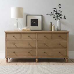 8 Drawer Wide Chest - Elkstone Mellow Oak - The Cotswold Company - thumbnail 1