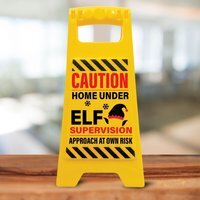 Caution Home Under Elf Supervision Sign  Funny Kids Xmas Decoration - Black