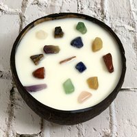 Coconut Shell Candle - White / Meditation-scented candle in a coconut shell with 7 Chakra gemstones. Crystals may shift during burning. Always burn on