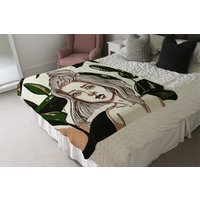 Young Woman In Tropical Leaves Blanket - Green - thumbnail 1