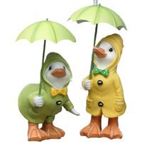 Garden Ducks with Umbrellas and Raincoats Ornament - GreenG