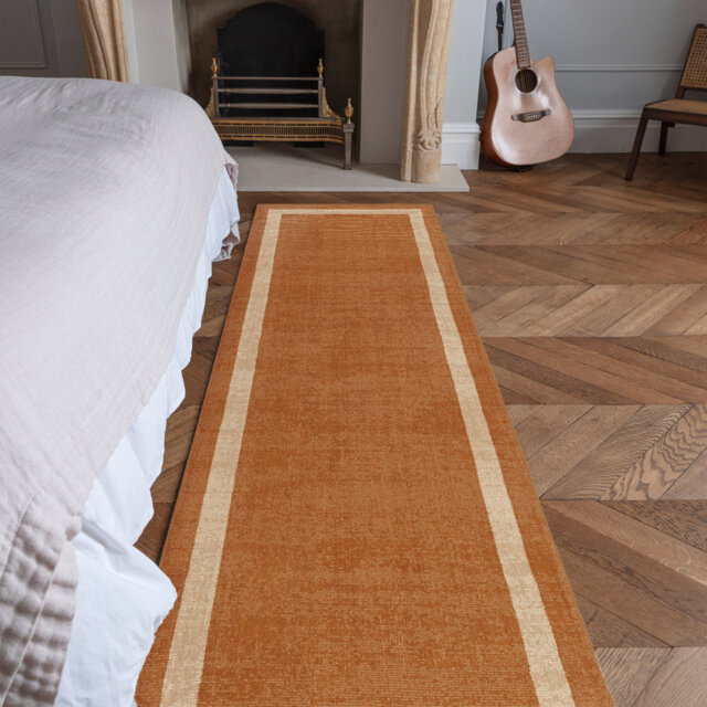 Anwitha Bordered Handmade Orange Area Rug