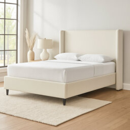 Ana Upholstered Wingback Bed