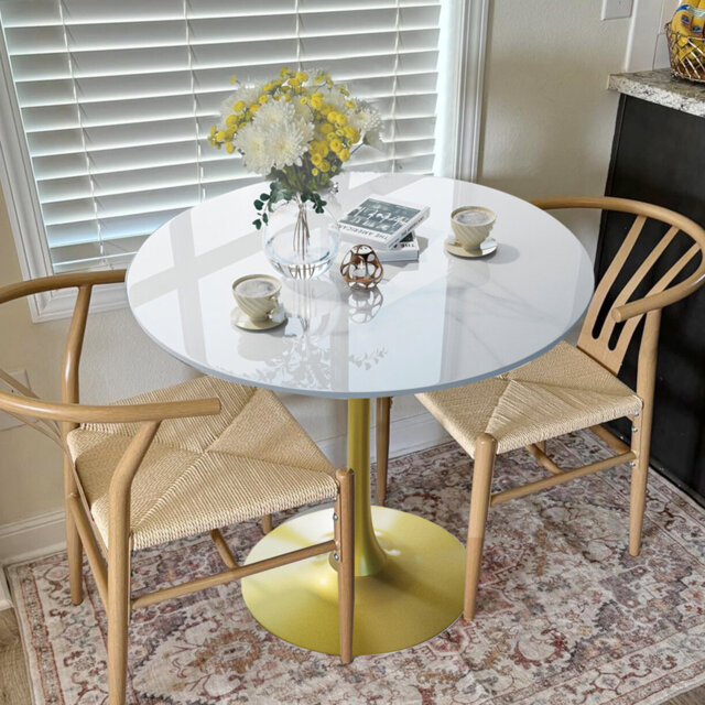 Cleofus Round Dining Table with Iron Base