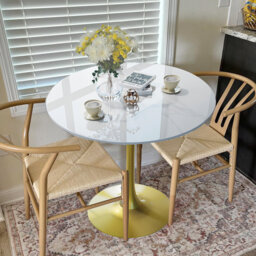 Cleofus Round Dining Table with Iron Base