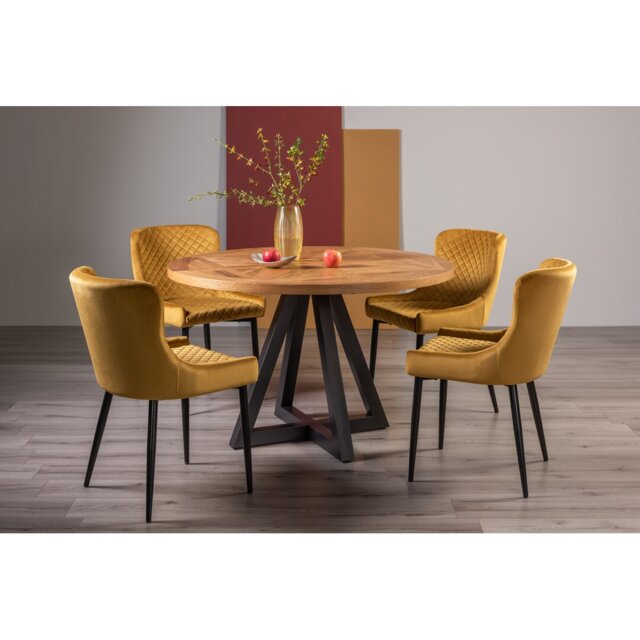 Rustic Oak and Peppercorn Cicrular Dining Table-and-4-Upholstered Arm Chair Quilted With Diamond Stitched Pattern and Sand Black Finish Velvet Fabric