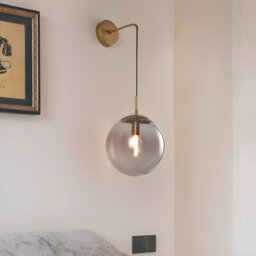 Modern Wall Sconce with Vintage Design - Clear Glass Globe and Retro Light Shade