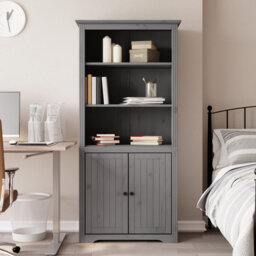 This classic bookcase, featuring a French design, makes a decorative as well as practical addition to your current decor.