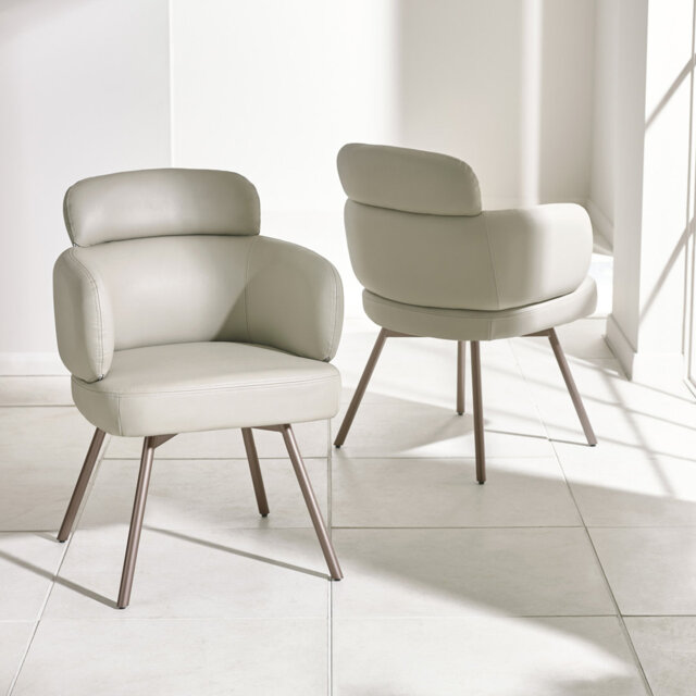 Demerion Set Of 2 Beige Faux Leather Swivel Dining Chairs