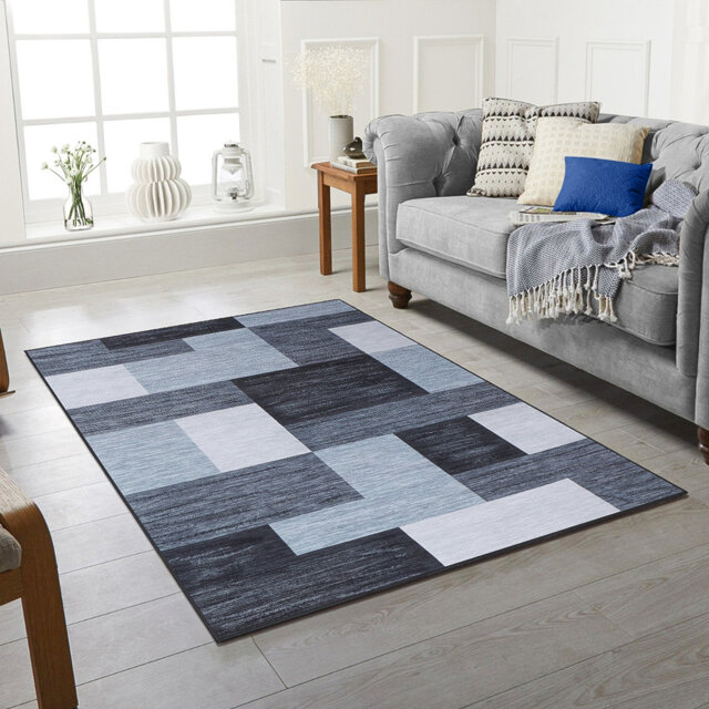 Arqam Black Area Rug
