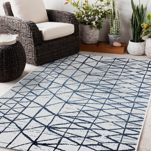 This modern rug is perfect for the living room, bedroom, terrace or kitchen. It is perfect for lines, triangles and beige / blue