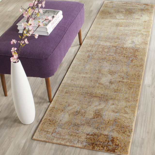 Daulton Looped/Hooked Gold Rug