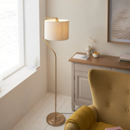 Clement Floor Lamp finished in Warm Brass and Natural