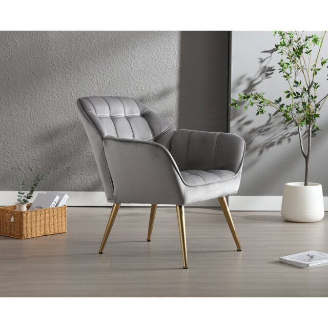 Armchair with metal legs made of velvet