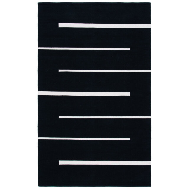 Estremera Area Rug In Black / Ivory