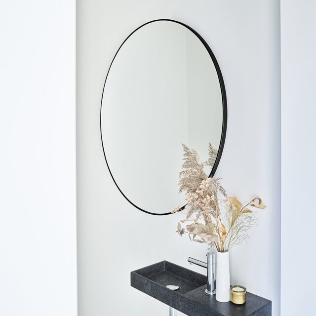 Avigail Round Metal Framed Wall Mounted Accent Mirror in Black