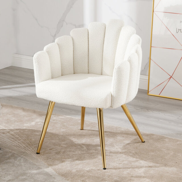 Armchair made of faux fur with metal legs