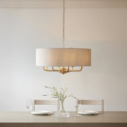 Azmoe 8-Light Chandelier finished in Vintage Brass and Natural