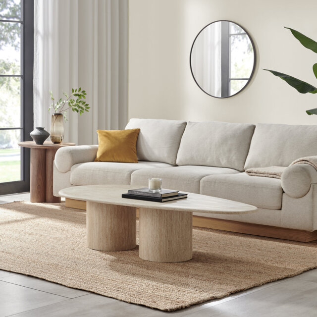 Delshawn Pebble Shaped Pillar Legged Travertine Stone Veneer Oval Coffee Table - Scandi Style