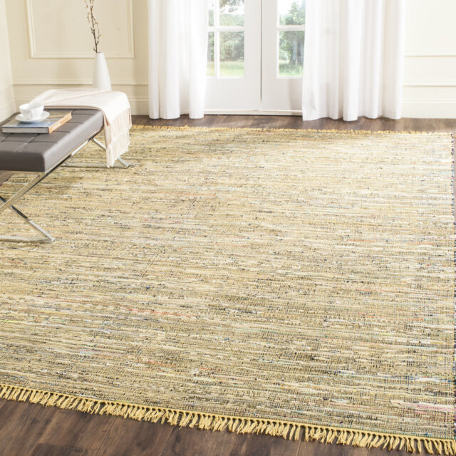 Dunkle Looped/Hooked Yellow Rug