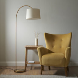 Thackinh Floor Lamp finished in Warm Brass and Cream