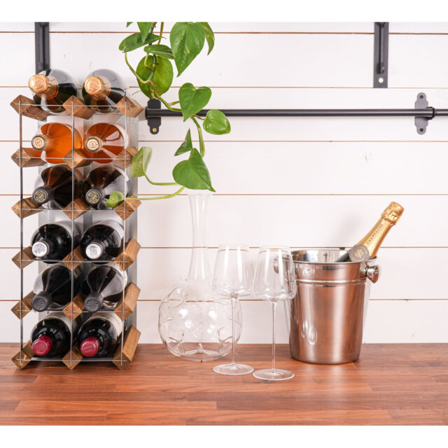 Wine rack for 15 bottles. Made of Swedish pine wood and produced in Sweden. The rack is delivered flat-packed.