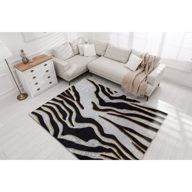 Miro Animal Print Machine Woven Area Rug