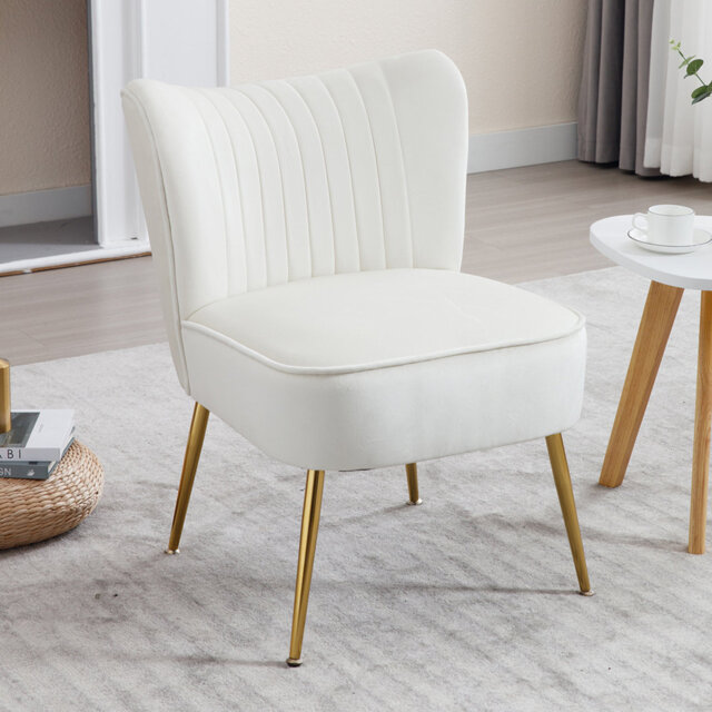 Armchair made of velvet with metal legs, beige