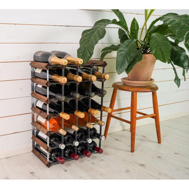 Wine rack for 30 bottles. Made of Swedish pine wood and produced in Sweden. The rack is delivered flat-packed.