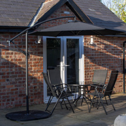 Samuel Alexander 4 Person Round Glass Top Garden Dining Set with Black Banana Parasol and Base - Size: 4 Seater - Wilko