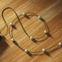 Twinkly 200 RGB Pearl Shaped LED Smart Green Cable USB String Light 12m - Size: 12 x 5.6 x 18cm - Wilko
