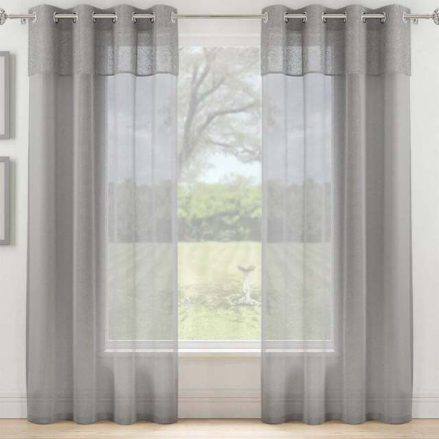Tyrone Textiles Andorra Grey Textured Header Eyelet Voile Panel Curtains 140 x 137cm - Size: W 140 x D 137cm - Wilko - image 1