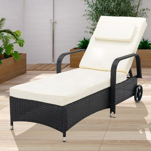 Black Rattan Recliner Sun Lounger with Wheels - Size: 103 x 59 x 196cm - MCC - Wilko - image 1