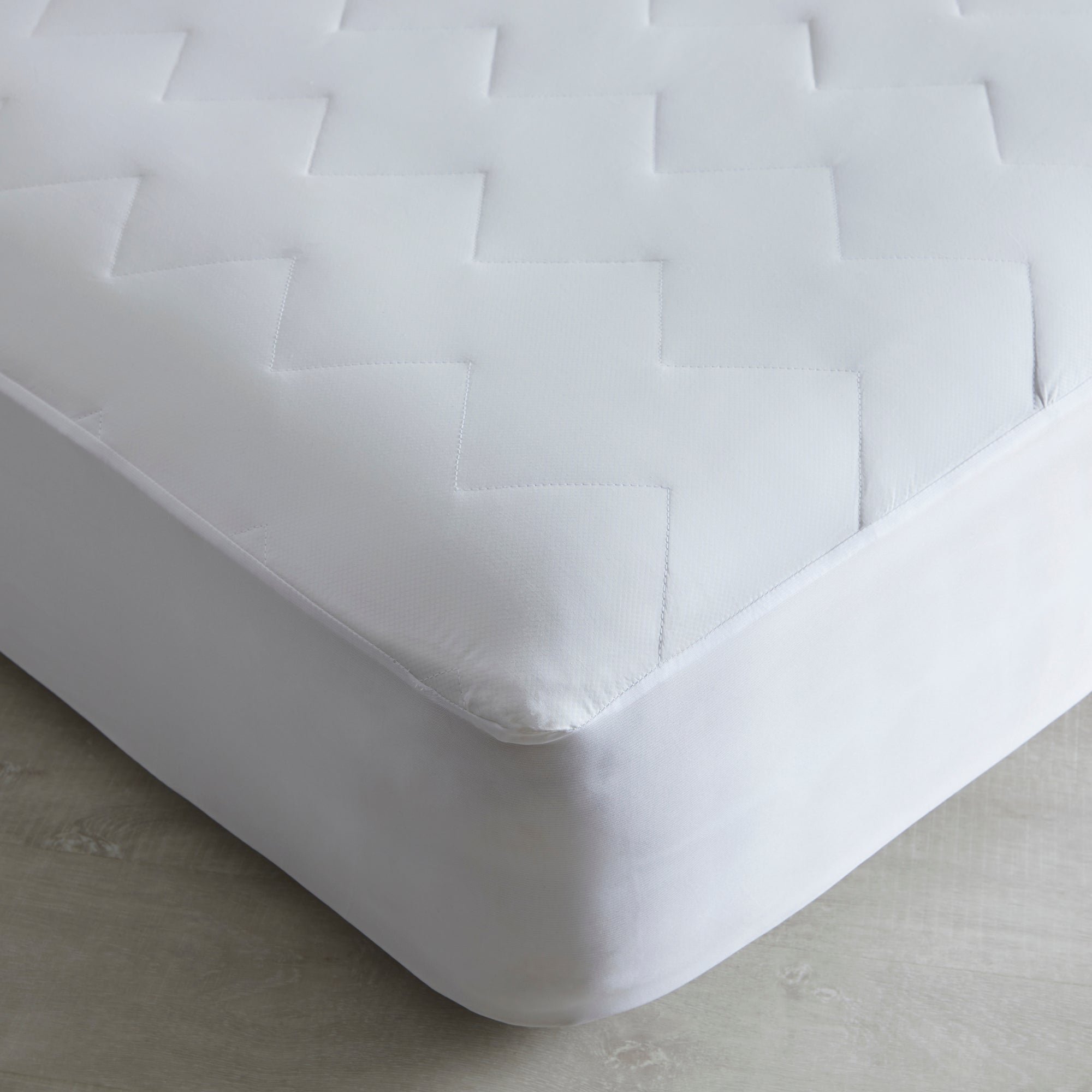 cot bed mattress protector dunelm