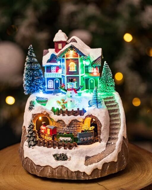 Traditional Festive Christmas Village Scene with Turning Train ...